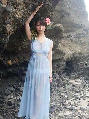 Neo Asian babe in see through dress is like goddess from ocean